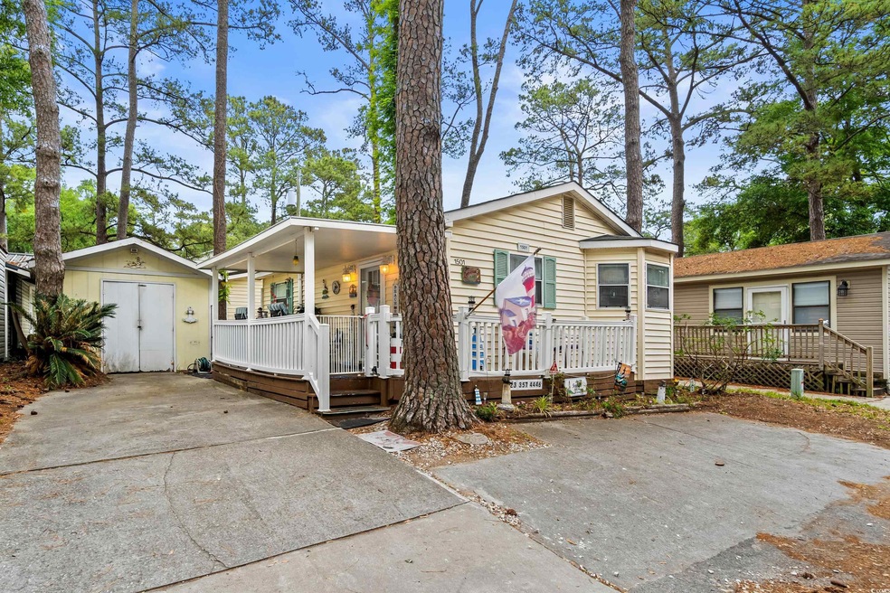 View of front of house featuring covered porch, a 