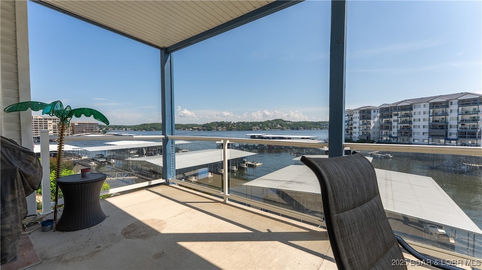 183 Upper Monarch Cove Dr unit 2F, Lake Ozark, MO 65049 - photo 1