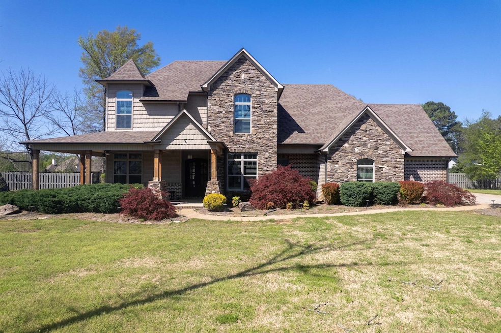 Craftsman-style home with covered porch, roof with