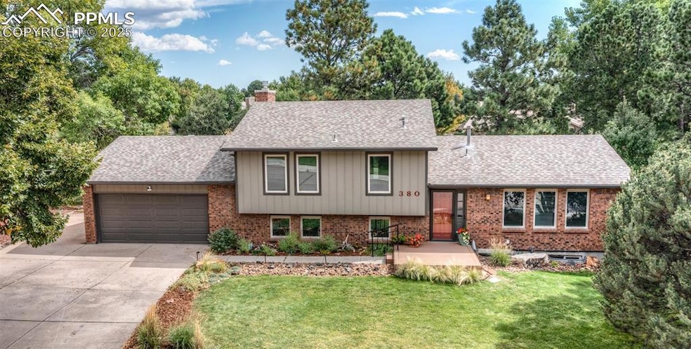 West Side, Rockrimmon 4-Level Home that backs to Open Space and Walking Trail!