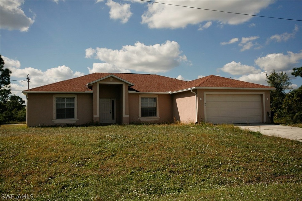 706 Oro Ave S, Lehigh Acres, FL 33974 - photo 1