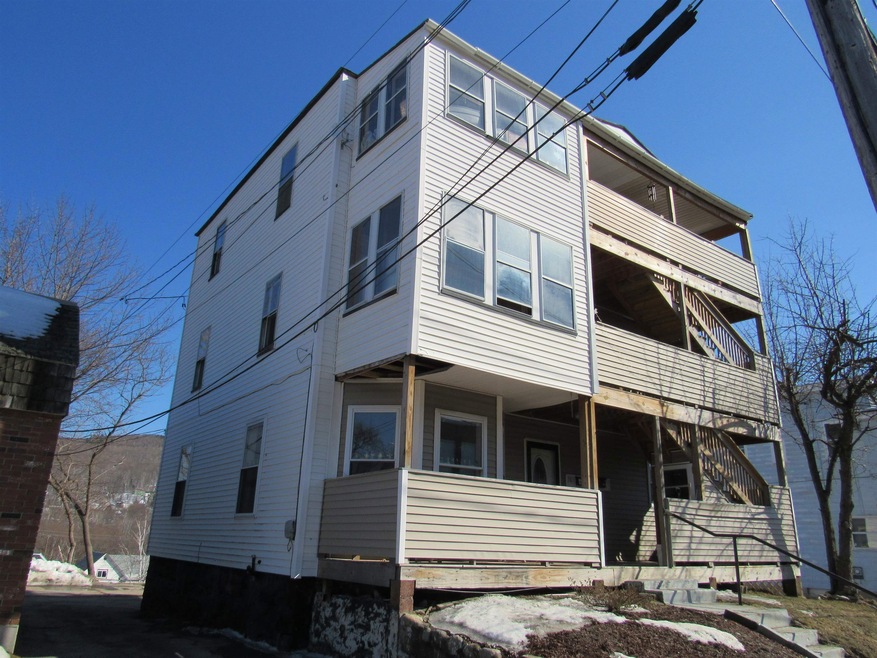 56 Pleasant St, Berlin, NH 03570 - photo 1
