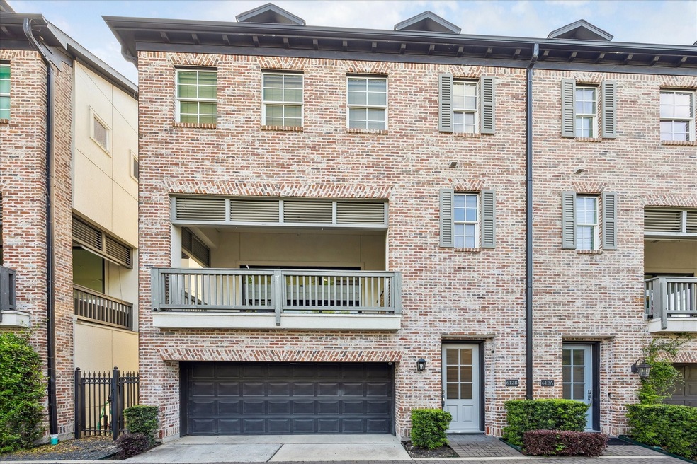 Features brick exterior and a two-car garage. Fabu