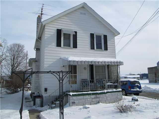 Exterior Front COZY HOME, ALUMINUM SIDING, CORNER 