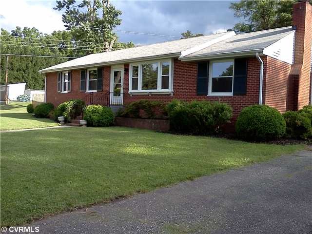 Exterior Front - well landscaped yard  with beautiful new insulated low E windows w/ argon