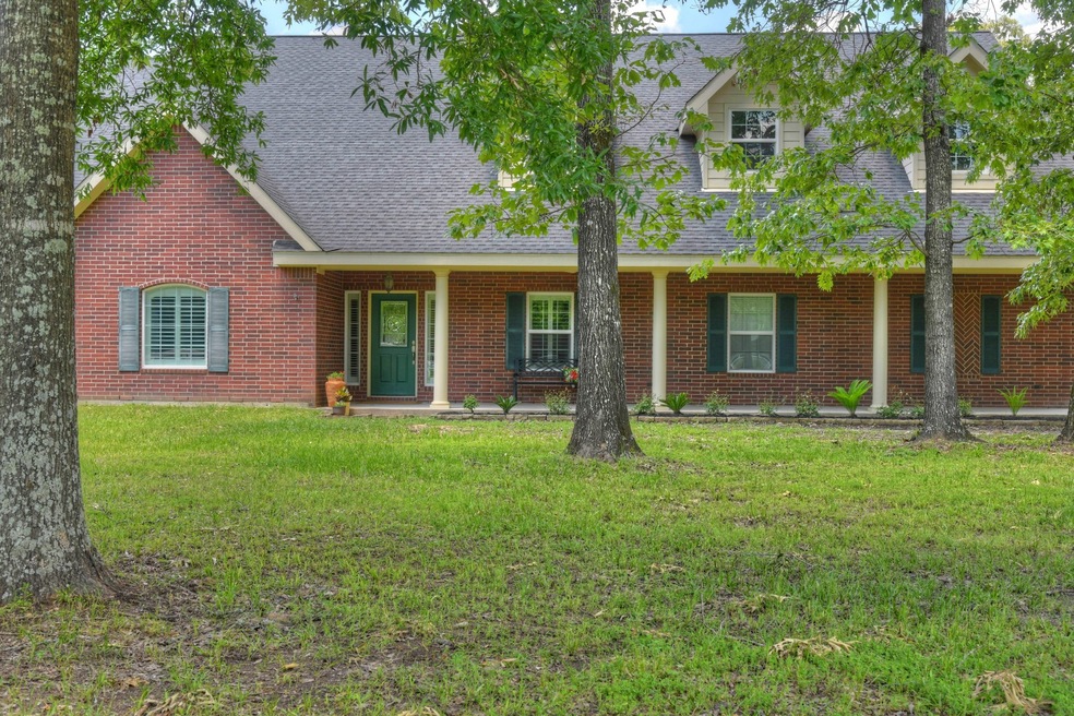 11062 N Hidden Oaks, Conroe, TX 77384 - photo 1