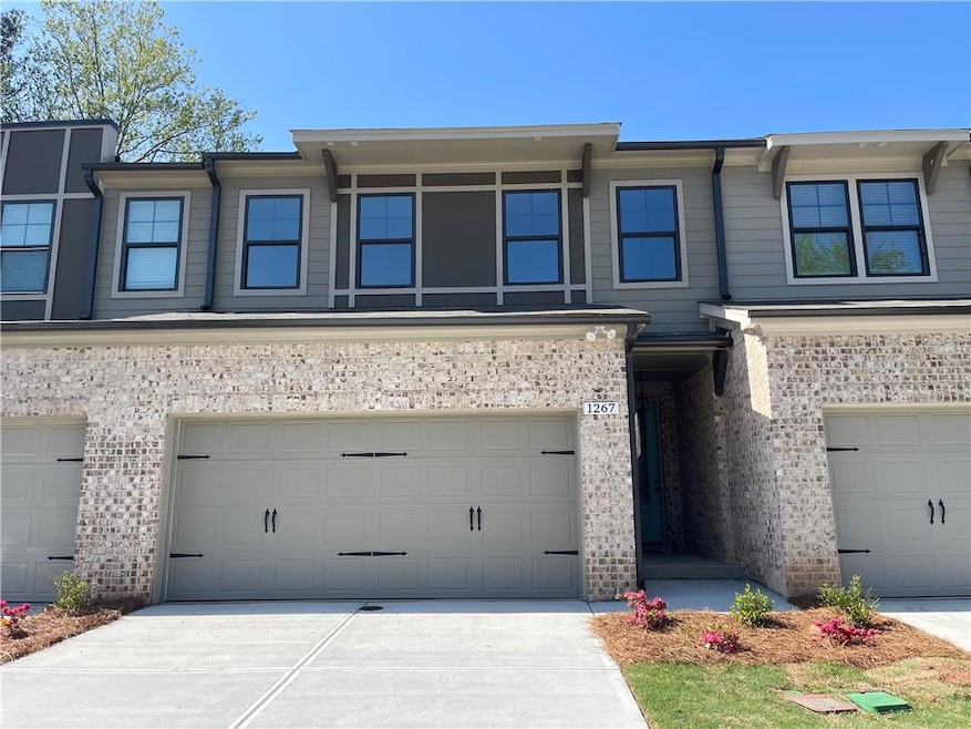 Stunning brick with a nice long driveway. This bea