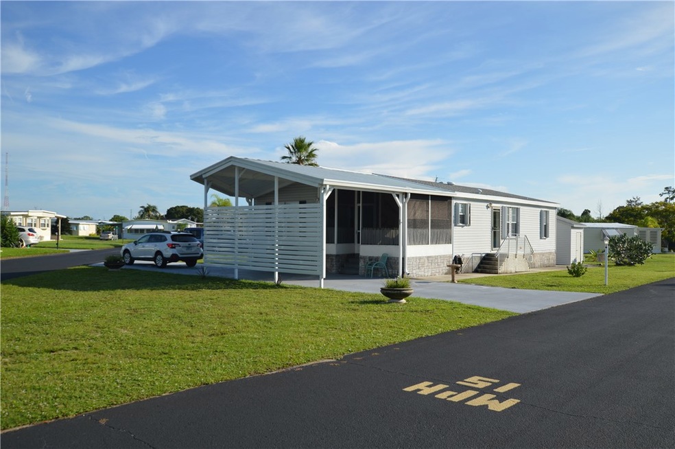 NICE CORNER LOT WITH DRIVE THRU CARPORT
