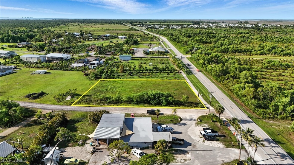 Aerial view of property and surrounding area featu