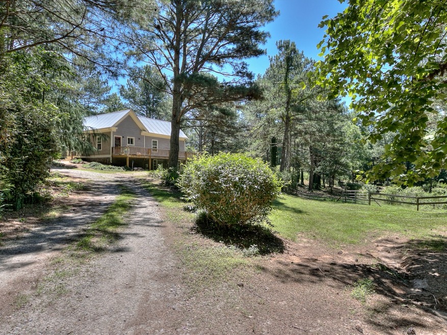 Adorable 1800's cottage sits on 3.6 lush acres...S