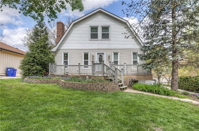 Charming 1.5 Story with front porch