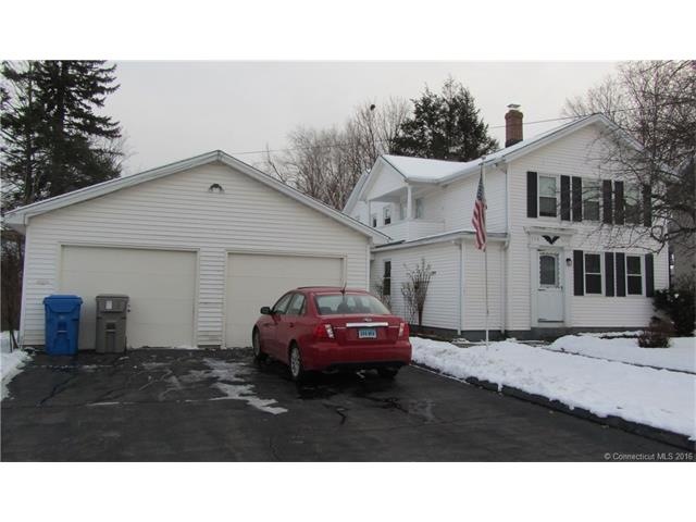 Exterior front, large 2 car garage.