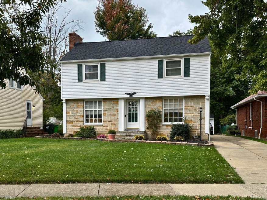 View of front of property with a front lawn