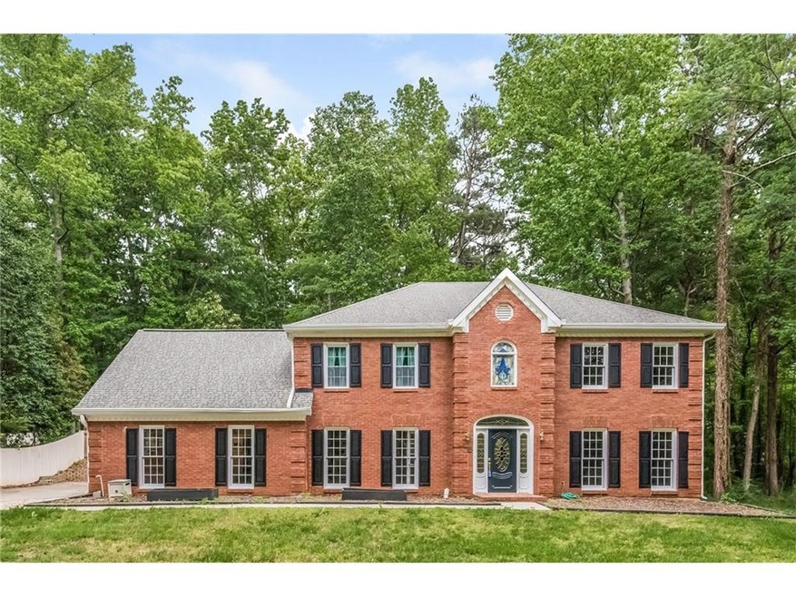 A STATELY TRADITIONAL HOME WITH LOVELY YARD