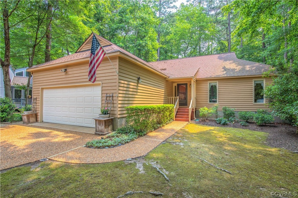 Welcome home!  No lawn mower needed here!  Natural