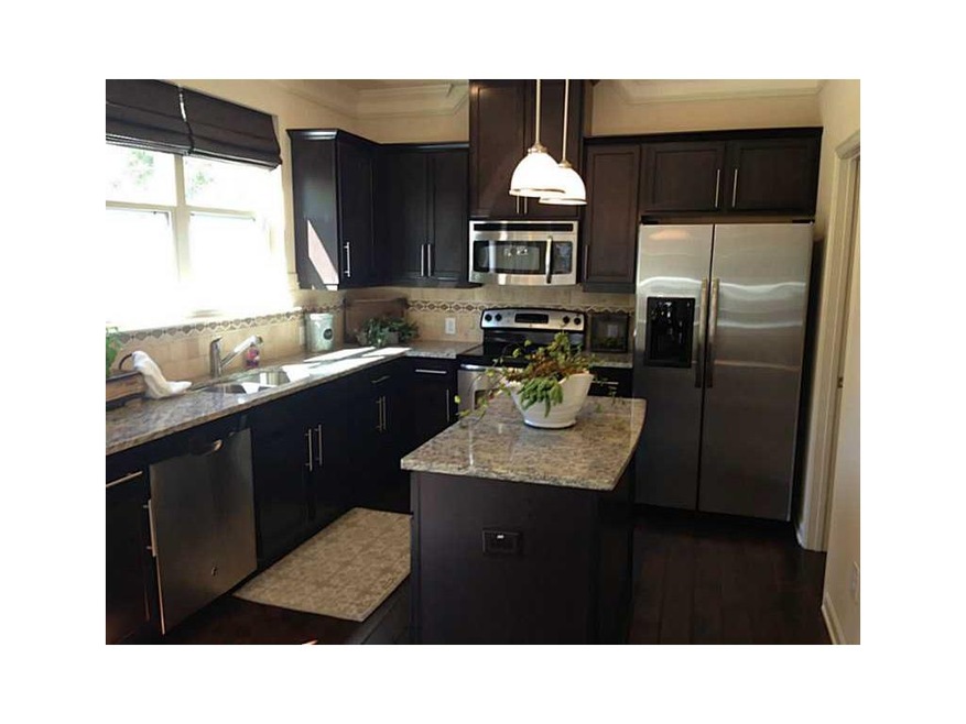 Kitchen. Photo not of actual home for sale, but is