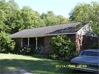 Single story home featuring a front yard