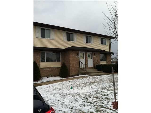 Exterior Front brick and vinyl