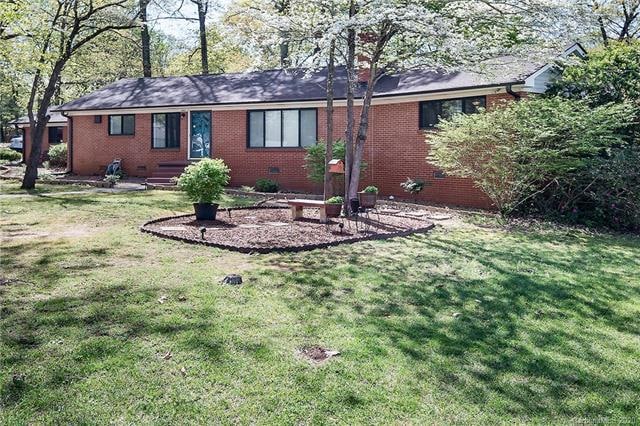 Welcome to 600 Groff St! Full brick ranch on 0.81 