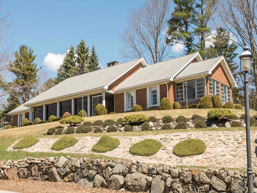 The home at 275 Shore Road sits high...