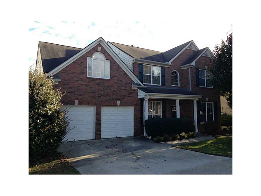 Facade/Exterior Front. Brick front, porch