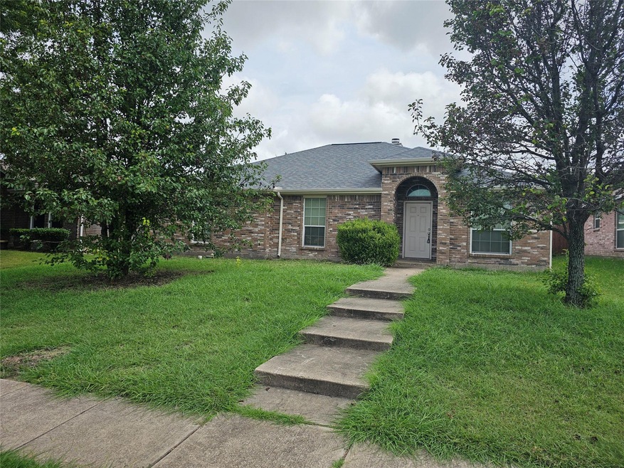 View of front of home with a front yard