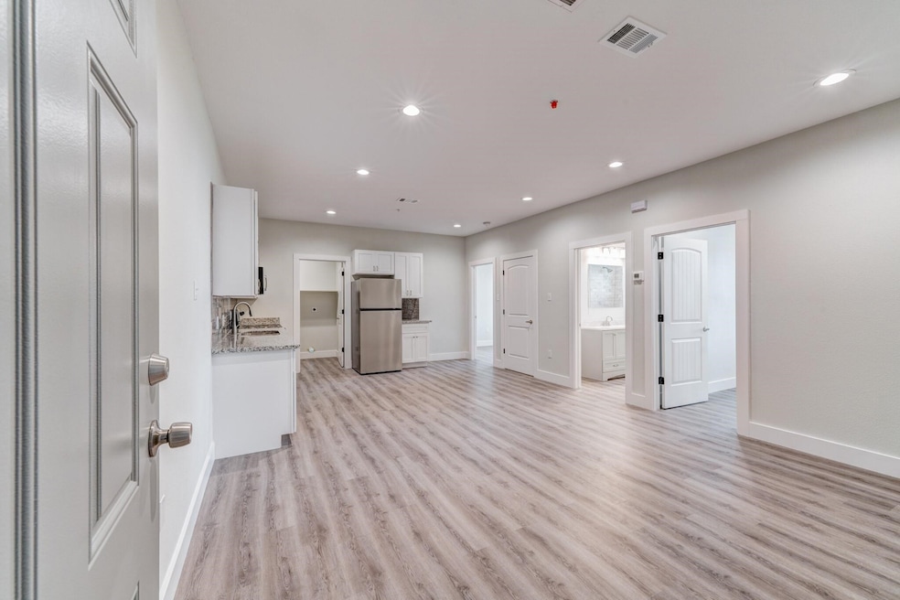 Check out the lovely open concept living / kitchen