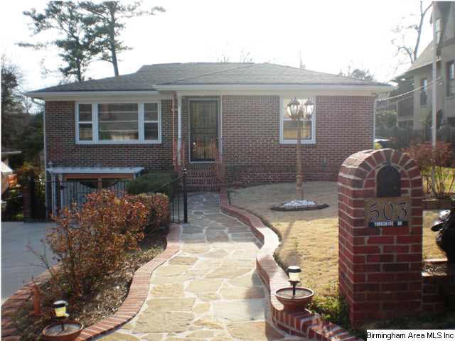 Front of home showing flagstone path