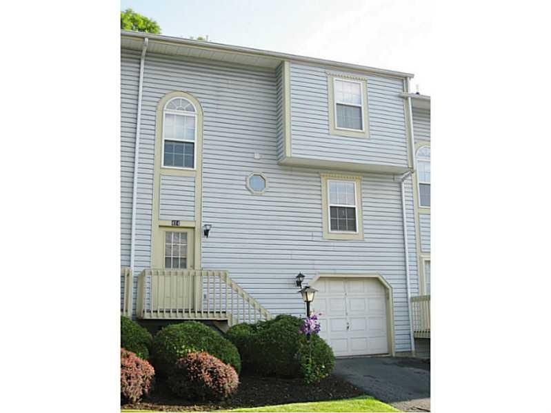 Exterior Front. Spacious updated townhouse.