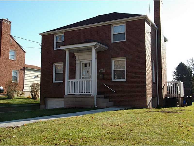 Exterior Front. Beautiful, Brick home on a large f