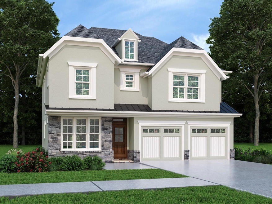 View of front of property featuring a garage, sto