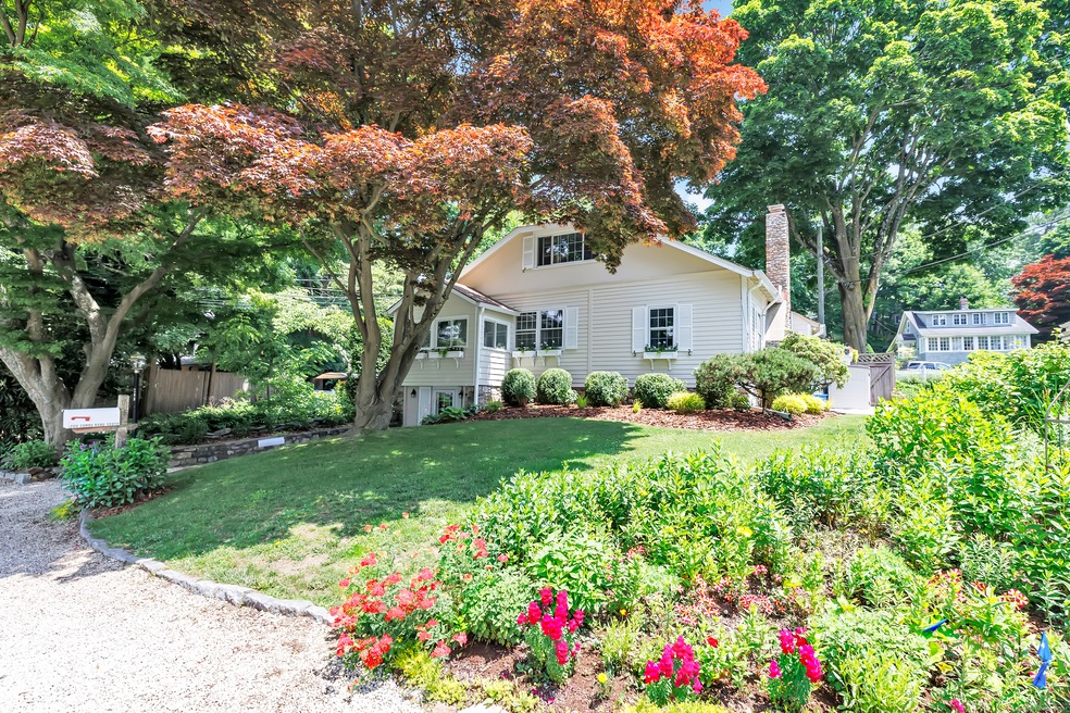 Welcome to 209 Compo Road South - a charming vinta