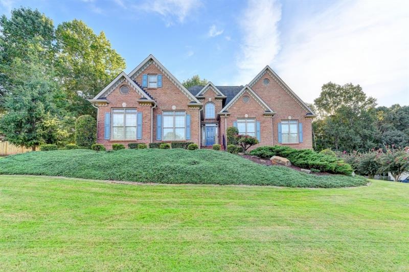 Welcome home! Beautiful brick & hardiplank home on
