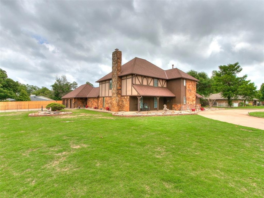 Back of property with a yard