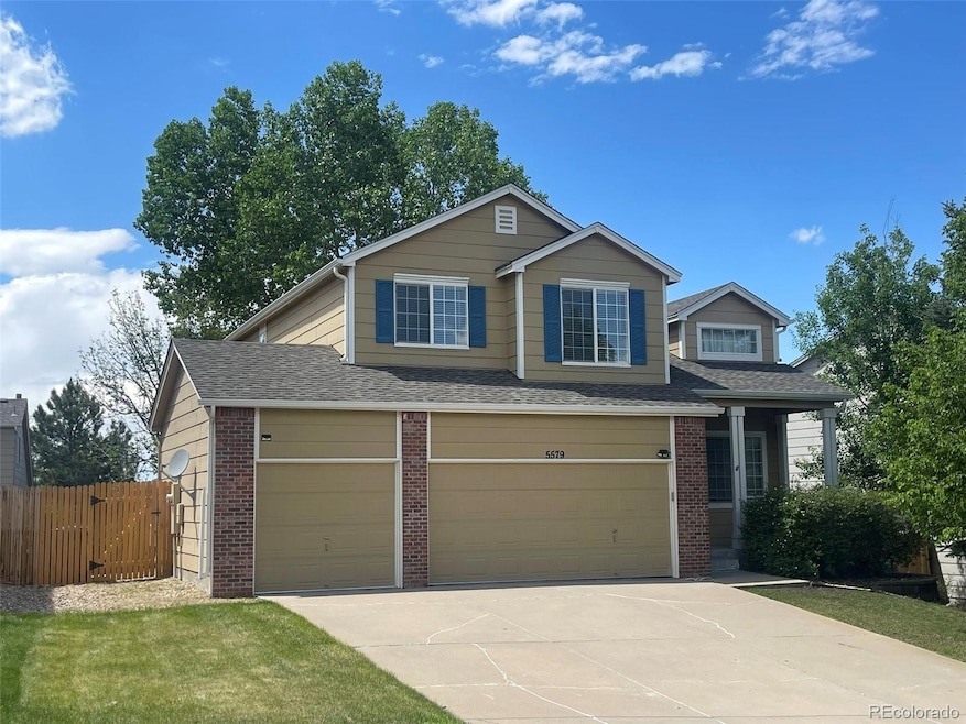 5579 S Versailles St, Aurora, CO 80015 - photo 1