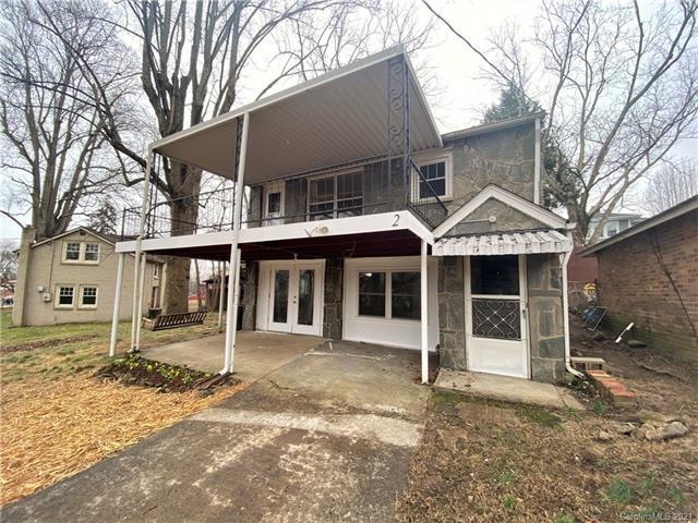 Covered entry and porches with separate french doors leading into the downstairs living area.