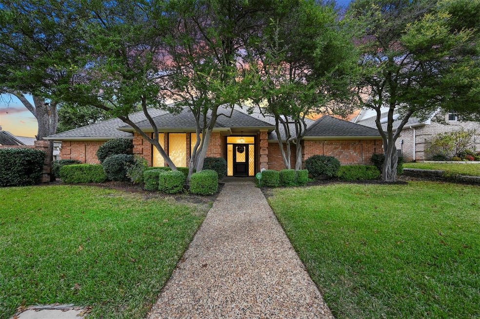 Ranch-style house with a yard