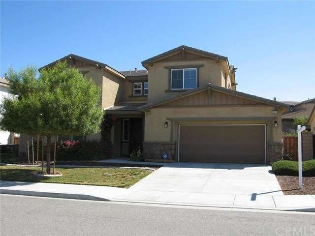 Level Entry with over-sized, 3 car Tandem Garage. 