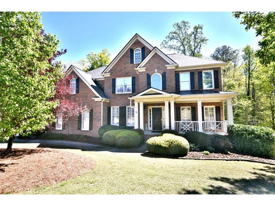 Beautiful brick home with welcoming front porch.