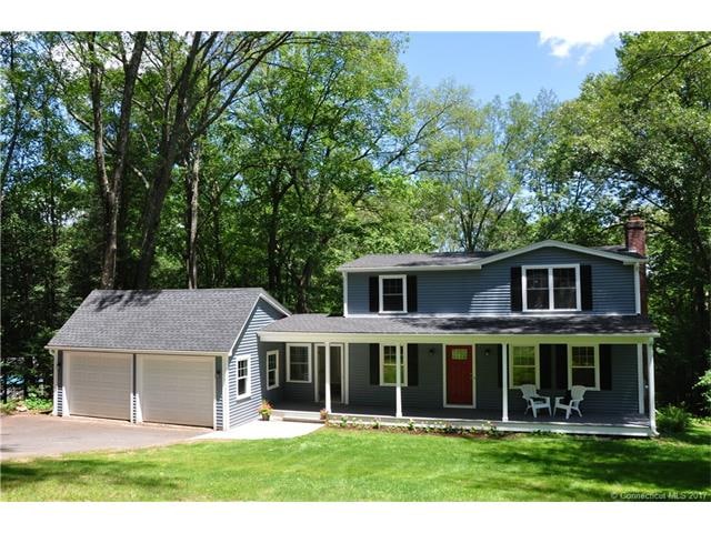 Exterior Front. New Trex Deck on Porch, New Roof, 