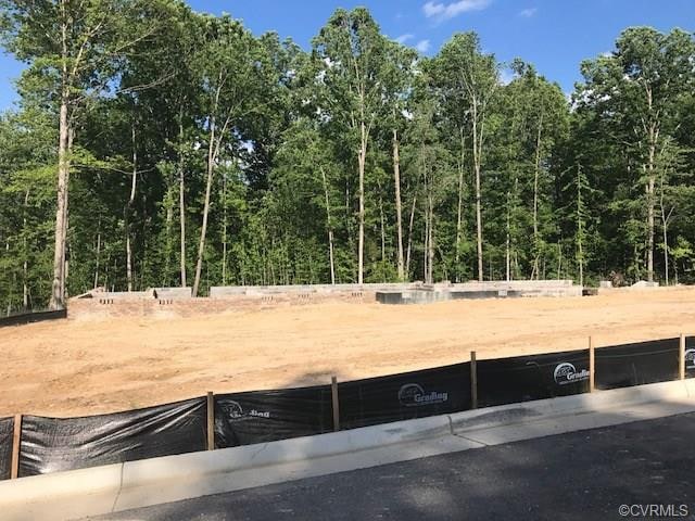 Home site showing foundation.  Home to be ready la