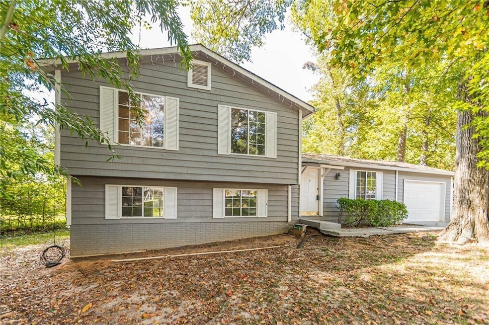 806 Houndstooth Trail NW, Lilburn, GA 30047 - photo 1