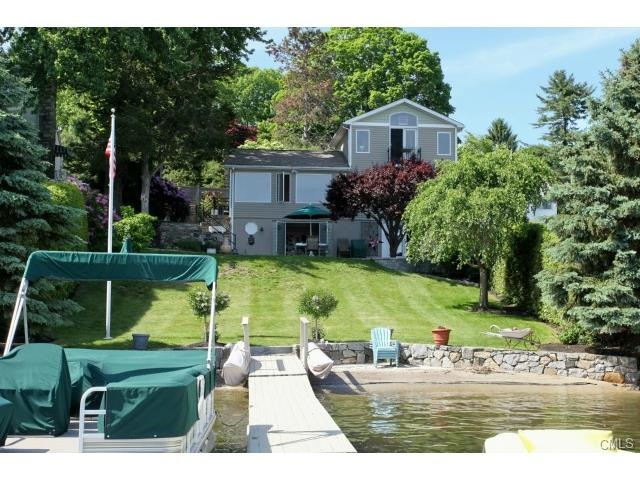 Enjoy 70 ft of level waterfront with private dock 