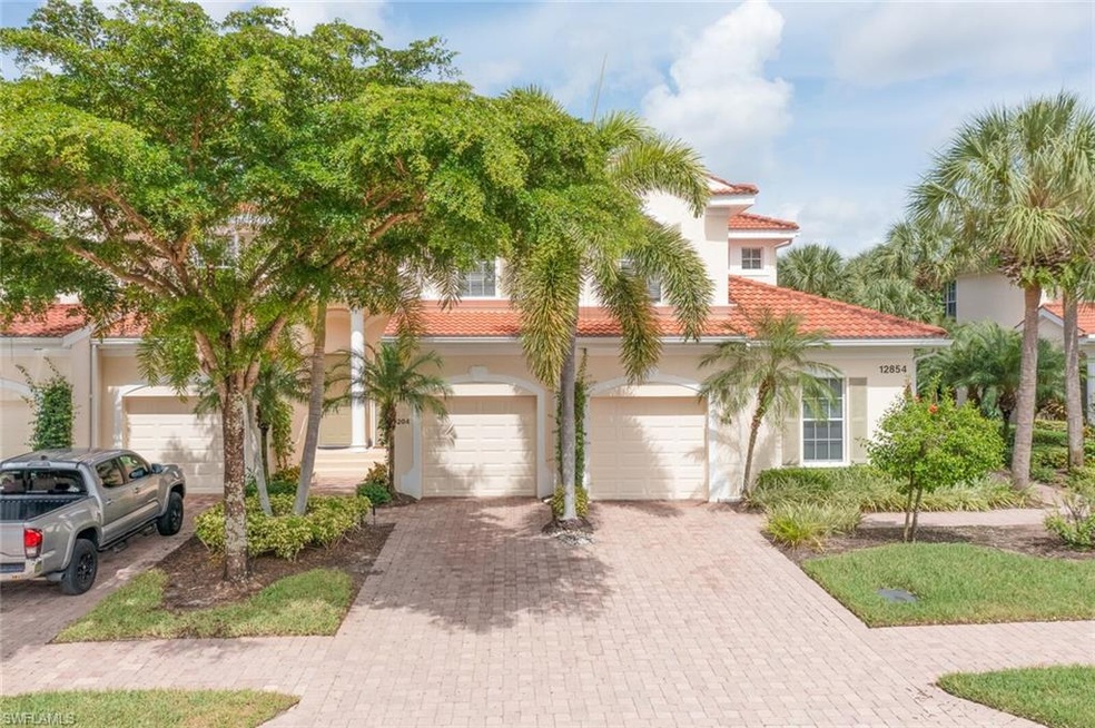 12854 Carrington Cir unit 7-204, Naples, FL 34105 - photo 1