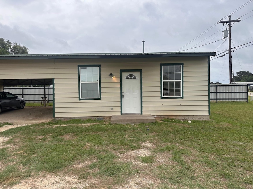 Bungalow-style house with an attached carport