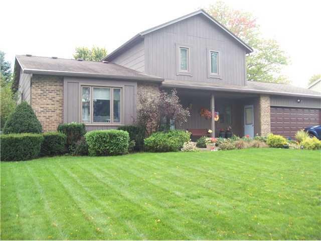 Exterior Front. BRICK AND CEDAR FRONT, NEW GARAGE 