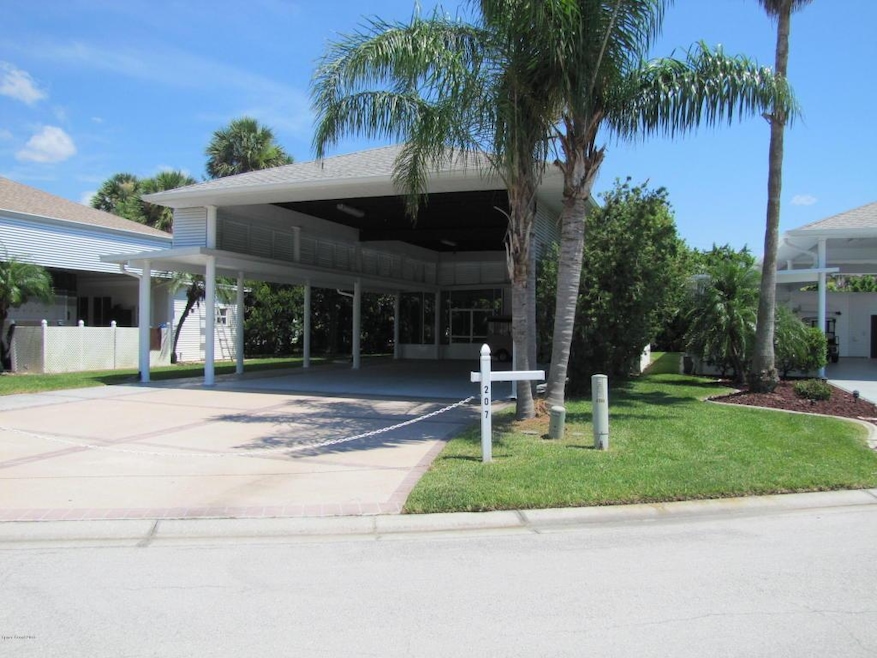 207 Coach Club Dr, Titusville, FL 32780 - photo 1