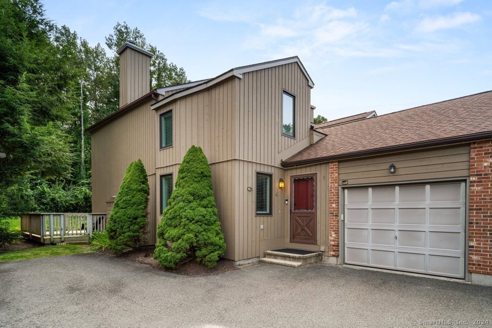 Coveted End Unit with Attached Garage Access.