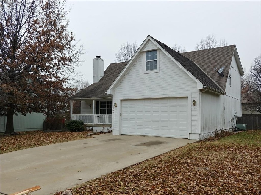 1508 Wrangler Way, Raymore, MO 64083 - photo 1