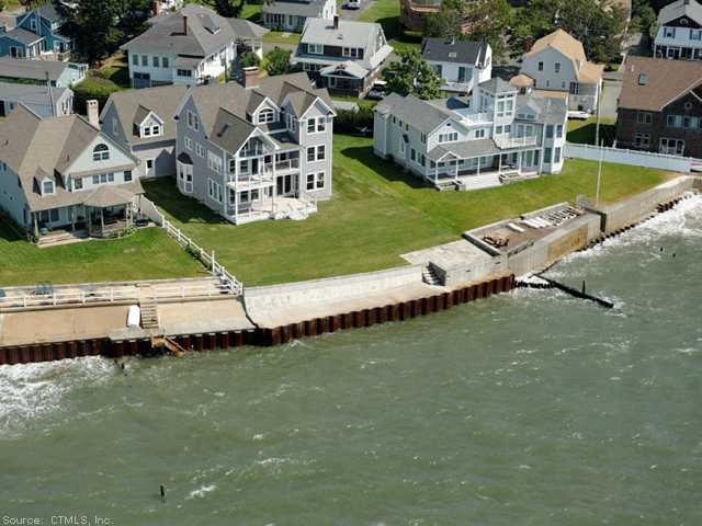 Exterior Front. Incredible WATERFRONT home with go